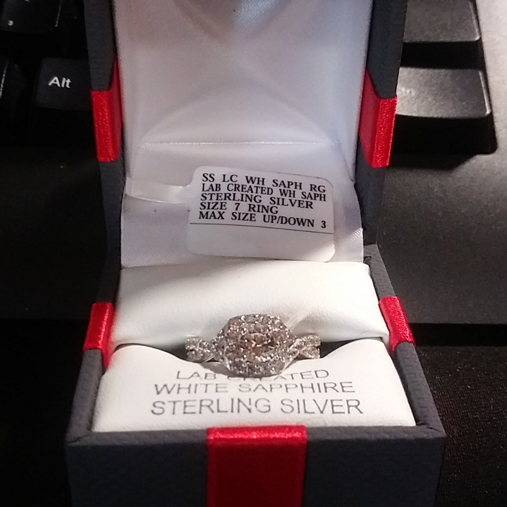 Sterling silver and white Sapphire size 7